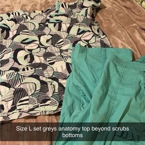 Size L greys anatomy top scrubs and beyond bottoms. Set
